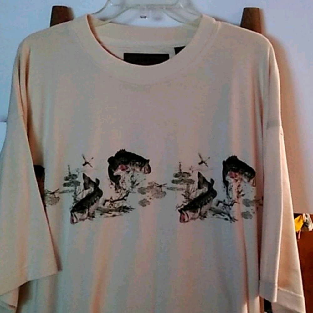T shirt worn once lost weight now to big